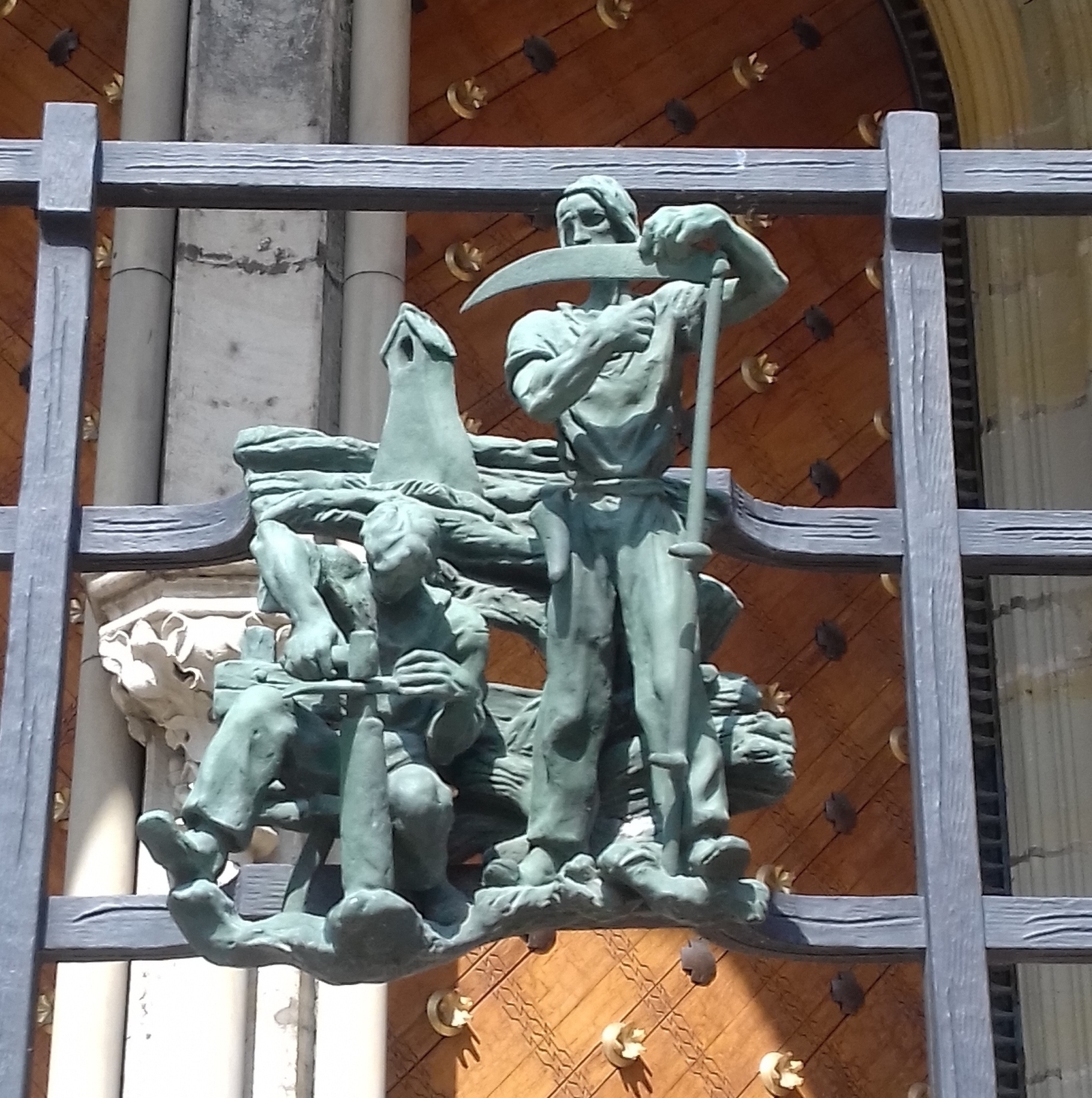 Scythe detail from St Vitus Cathedral, Prague